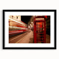 Colorful abstract art print of London scenery in vibrant hues on a large framed canvas, ideal for living room decor.