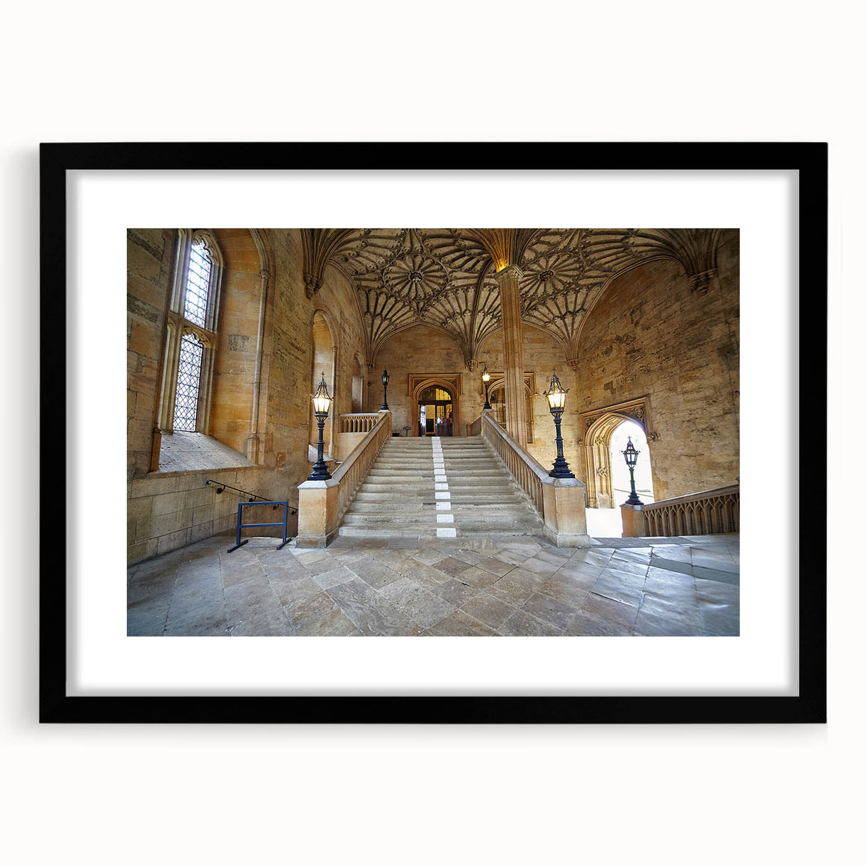 Abstract art print of Oxford scenery in vibrant colors on a large framed canvas, suitable for living room decor.