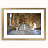 Abstract art print of Oxford scenery in muted earth tones on a framed canvas, suitable for dining room decor.