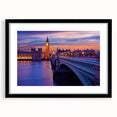 Colorful abstract art print of the Thames River, in a black frame with mat, ideal for living room decor.