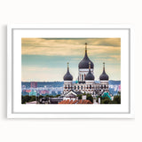 Textured abstract art print depicting a European landscape in muted earth tones on a framed white mat.