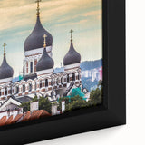 Black wall art featuring a textured, colorful abstract of Estonia scenery on a large framed canvas.