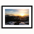 Abstract art print of the French Alps in vibrant colors on a large framed canvas, ideal for living room decor.