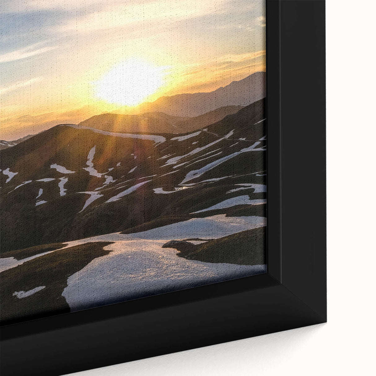 Black wall art featuring a textured close-up of the French Alps with vibrant, colorful accents on a framed canvas.