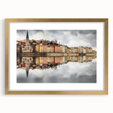 Abstract art print of Lyon scenery in gold frame, featuring muted earth tones, ideal for dining room decor.