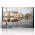 Large abstract wall art depicting a stylized Lyon cityscape in muted gray and blue tones, framed in black acrylic.