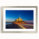 Textured art depicting an abstract European scenery in muted earth tones on a framed silver mat, suitable for bedroom decor.