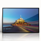 Large abstract wall art depicting a European scenery in muted colors on a black framed acrylic.