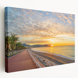 Side view of a stretched canvas depicting the scenic Nice, France coastline in soft pastel shades.