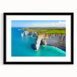 Colorful abstract art print of Normandy scenery, textured in a black frame, ideal for living room decor.