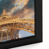 Extra large framed canvas featuring a textured depiction of a Paris street scene in black with colorful accents.