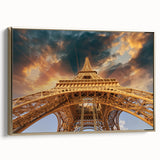 Framed canvas of a vintage Paris landscape in black and gold tones, ideal for bedroom wall art.