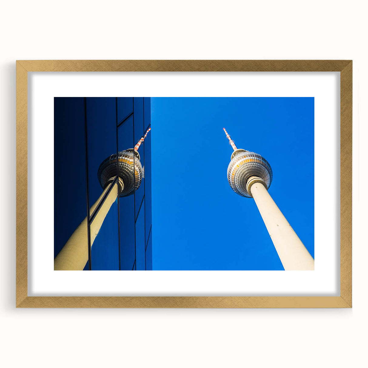 Abstract art print of Berlin skyline in muted gray and blue tones on a framed canvas, suitable for dining room decor.