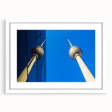 Textured abstract art print depicting the Berlin skyline in muted gray tones, framed with a white mat, ideal for bedroom art.