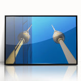 Large abstract wall art depicting Berlin's cityscape in muted gray and blue tones, framed in black acrylic.