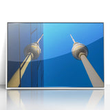 Mid-century modernist art depicting Berlin skyline in muted gray and blue tones on framed acrylic.