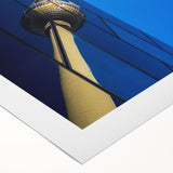 Art deco poster of Berlin skyline in muted gray and blue tones on rolled canvas, suitable for dining room wall art.