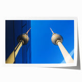 Extra large rolled print of Berlin scenery with floral elements in muted earth tones.