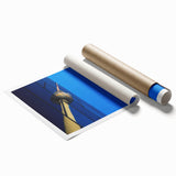 Extra large rolled print of Berlin scenery with soft floral accents in pastel shades.