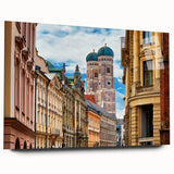 Large abstract depiction of Munich skyline in muted blue and gray tones on acrylic glass.