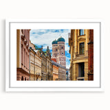 Textured art print of Munich skyline in muted blue tones on a framed canvas, ideal for bedroom wall decor.