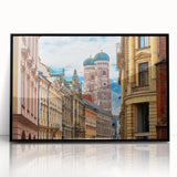 Large abstract wall art of Munich skyline in muted gray and blue tones on a framed acrylic.