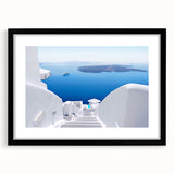 Extra large abstract art print of Santorini with vibrant blue and white hues on a textured canvas, framed in black.