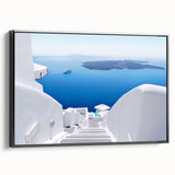Black and white framed canvas of Santorini landscape, ideal for bedroom wall art.