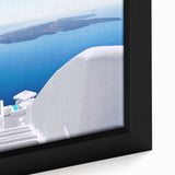 Extra large framed canvas featuring a black textured depiction of Santorini with vibrant blue and white accents.