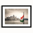 Extra large abstract art print featuring a colorful, textured depiction of a European scenery on a black framed canvas.