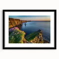 Abstract art print of a colorful Irish landscape, in a black frame with mat, ideal for living room decor.
