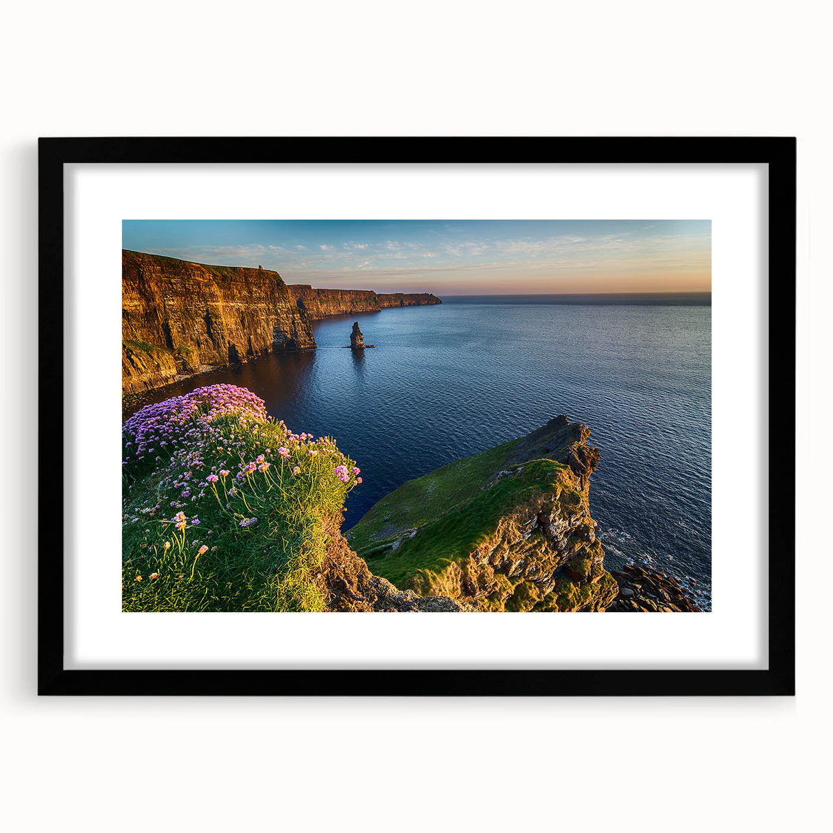 Abstract art print of a colorful Irish landscape, in a black frame with mat, ideal for living room decor.