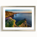 Extra large abstract art print of a textured Irish landscape in muted greens and blues, framed in silver.