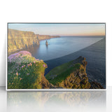 Mid-century modernist art depicting a serene Irish landscape in muted green and blue tones, framed acrylic print.