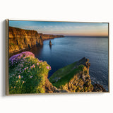 Framed canvas featuring a vintage-style landscape painting of an Irish countryside, in muted greens and golds.