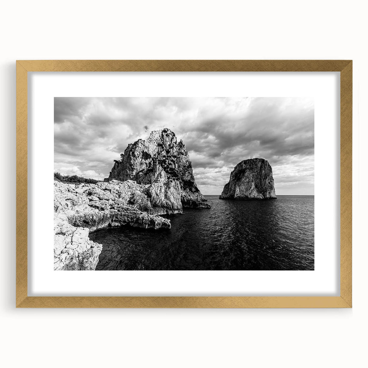 Abstract art print of Capri, Italy in muted blue and white tones on a framed canvas, suitable for dining room decor.