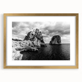 Abstract art print of Capri, Italy in muted blue and white tones on a framed canvas, suitable for dining room decor.