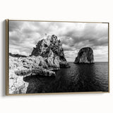 Framed canvas featuring a vintage-style landscape painting of Capri, Italy, in muted gold and black tones.