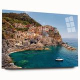 Acrylic print of Cinque Terre with vivid blue and pastel houses, ideal for bedroom or dining room art.