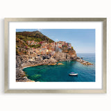Extra large framed wall art depicting the Cinque Terre coastline in muted pastel tones, ideal for living room decor.