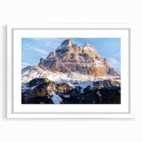 Textured abstract art print of the Dolomites in Italy, featuring muted earth tones on a framed white mat.