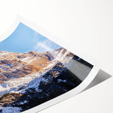 Extra large wall art featuring line art flowers on a rolled print, set against the Dolomites in muted earth tones.