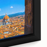 Framed canvas of Florence scenery in textured black with vibrant color accents, suitable for large living room walls.