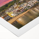 Art deco poster of Naples' skyline in muted blue and beige tones on rolled canvas, suitable for dining room decor.