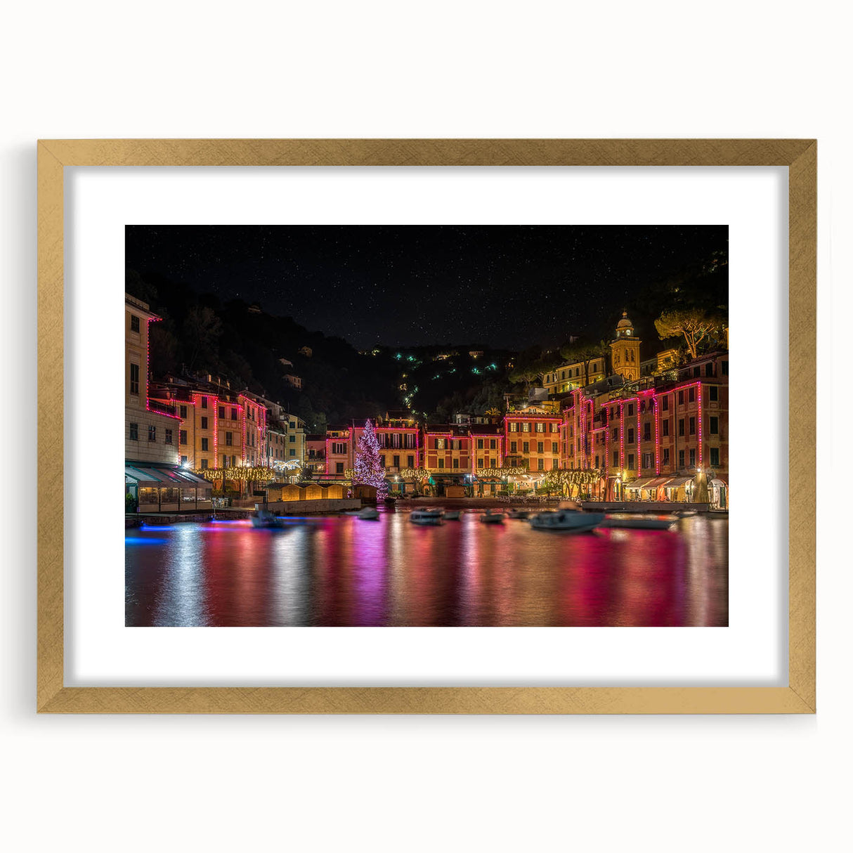 Abstract art print of Portofino, Italy, featuring vibrant blue and green hues on a gold-framed canvas.