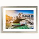 Extra large wall art featuring an abstract depiction of Venice in textured hues of blue and silver, framed with a mat.