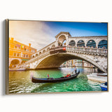 Framed canvas of a vintage Venice landscape in muted gold and black tones, ideal for bedroom wall art.