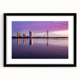 Colorful abstract art print of a European scenery in Latvia, framed in black with a textured finish.
