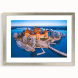 Extra large abstract art print of a textured European scenery in muted earth tones, framed in silver.