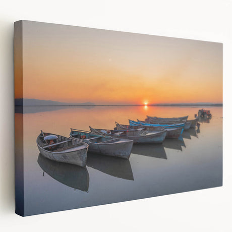 Large stretched canvas depicting a Mediterranean seaside town, in vibrant blues and whites, suitable for kitchen wall art.